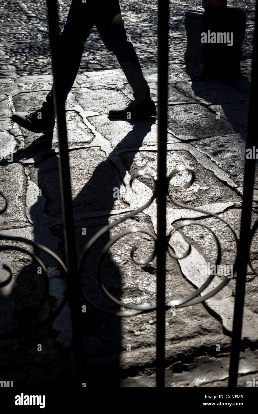 Person walking in the Spanish colonial-era city centre, Antigua, Guatemala, Central America Stock Photo