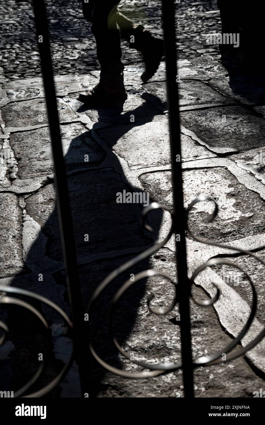Person walking in the Spanish colonial-era city centre, Antigua, Guatemala, Central America Stock Photo