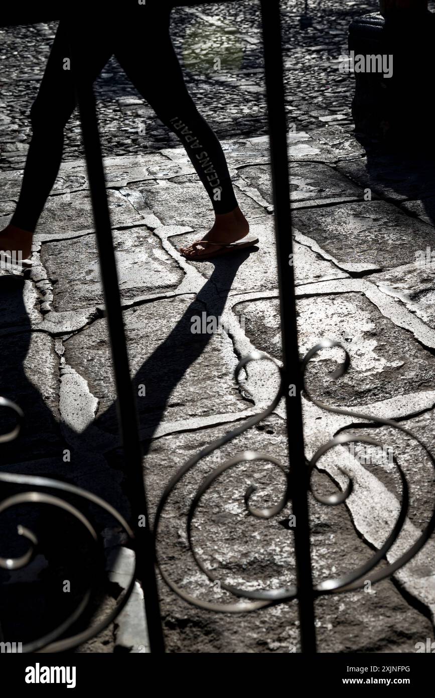 Person walking in the Spanish colonial-era city centre, Antigua, Guatemala, Central America Stock Photo