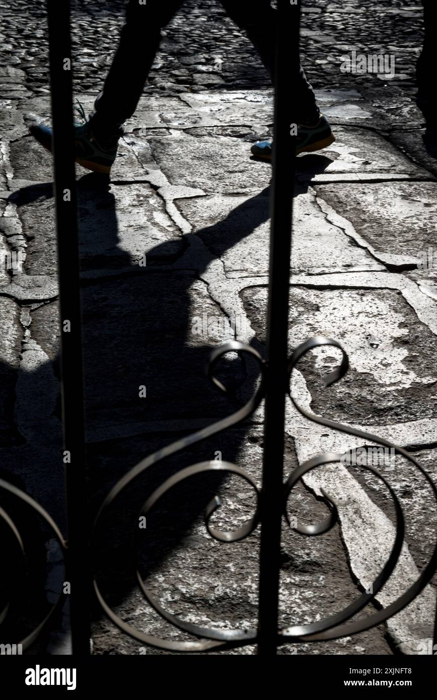 Person walking in the Spanish colonial-era city centre, Antigua, Guatemala, Central America Stock Photo