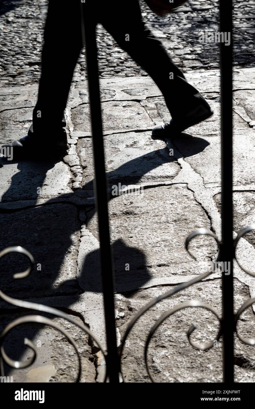 Person walking in the Spanish colonial-era city centre, Antigua, Guatemala, Central America Stock Photo