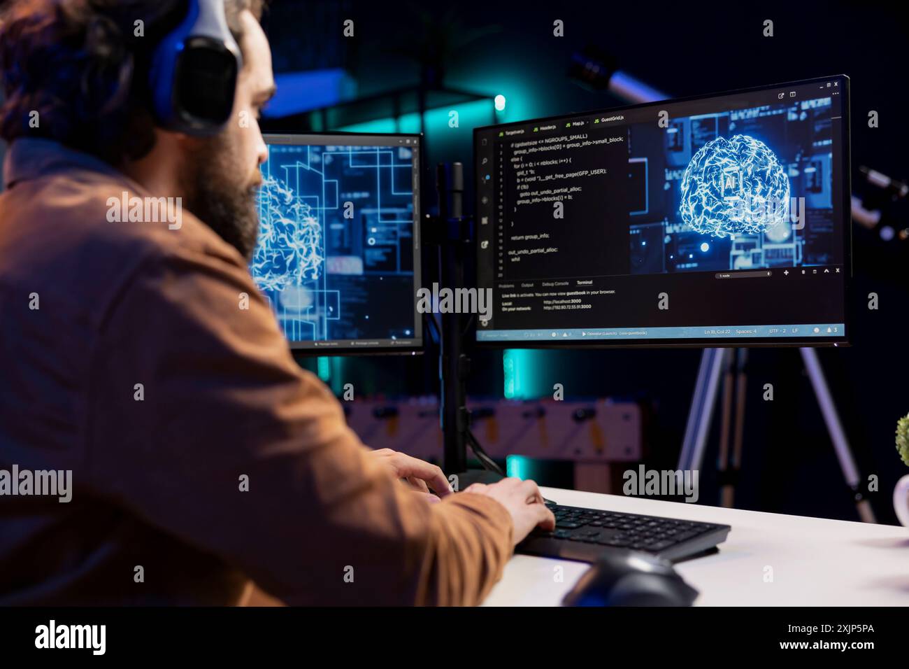 Programmer listening music while doing maintenance on artificial ...