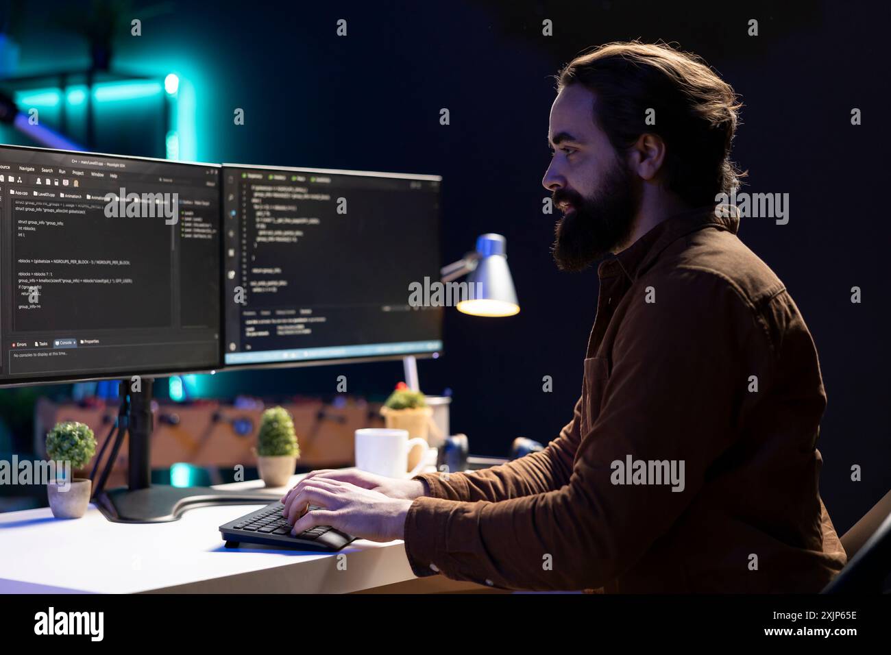 Freelancing computer scientist typing hi-res stock photography and ...