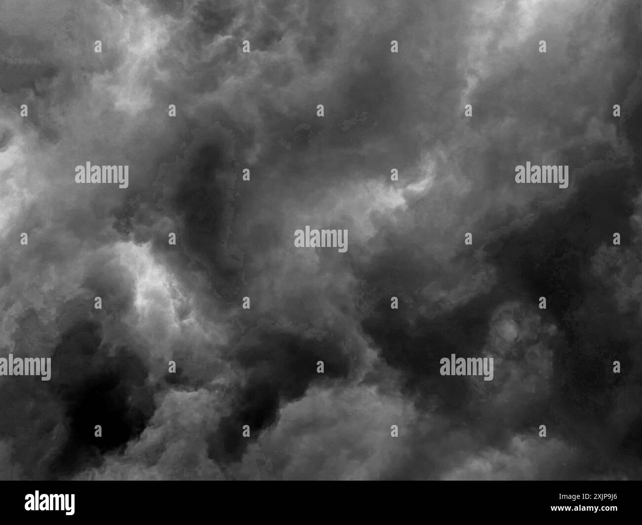 The image shows a sky filled with dark, heavy clouds. The clouds are very dense and create a dramatic and foreboding atmosphere. The image is in black Stock Photo