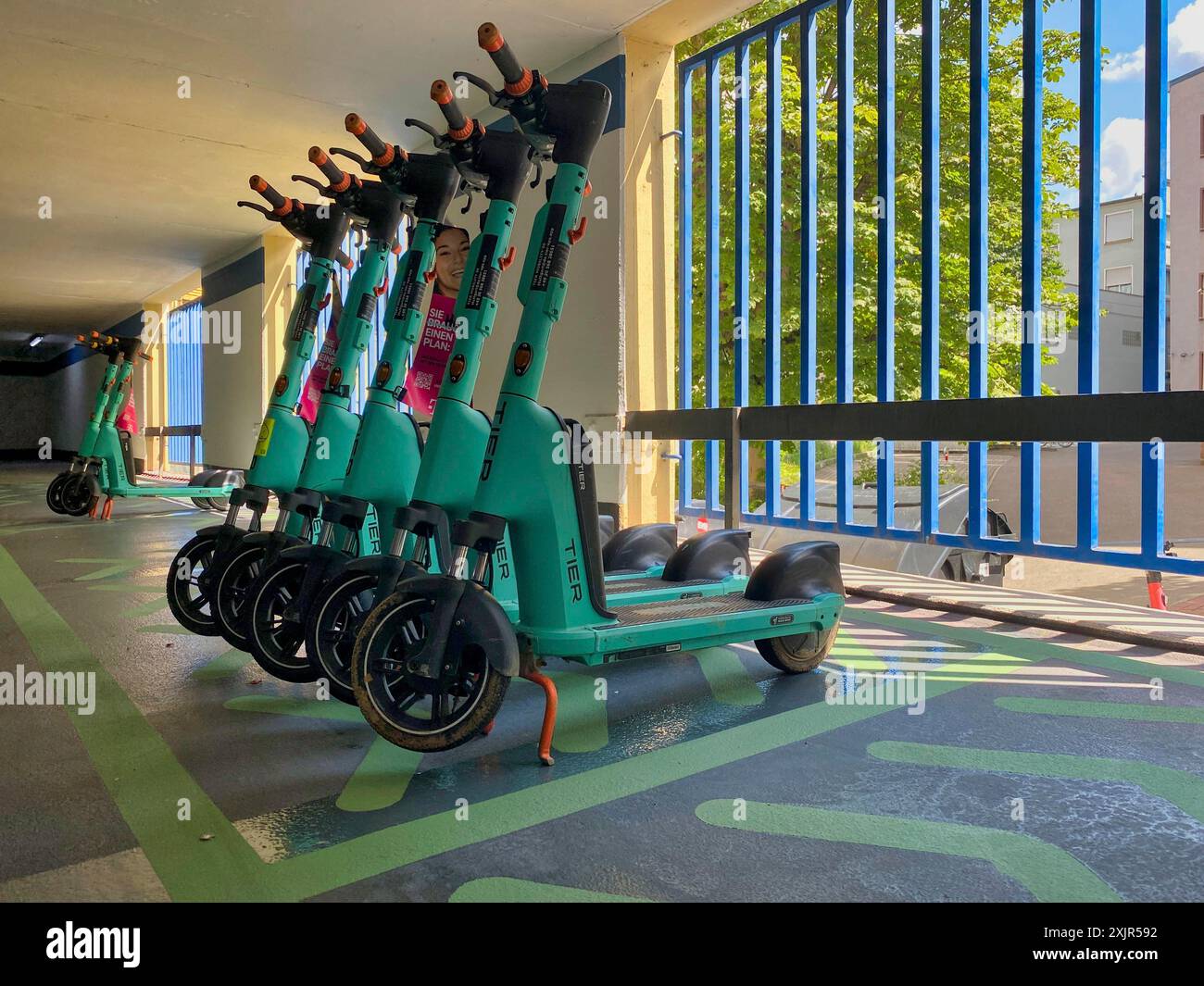 E-scooters in TIER bike hire, designated collection point, multi-storey car park, Bad Cannstatt, Stuttgart, Baden-Wuerttemberg, Germany Stock Photo