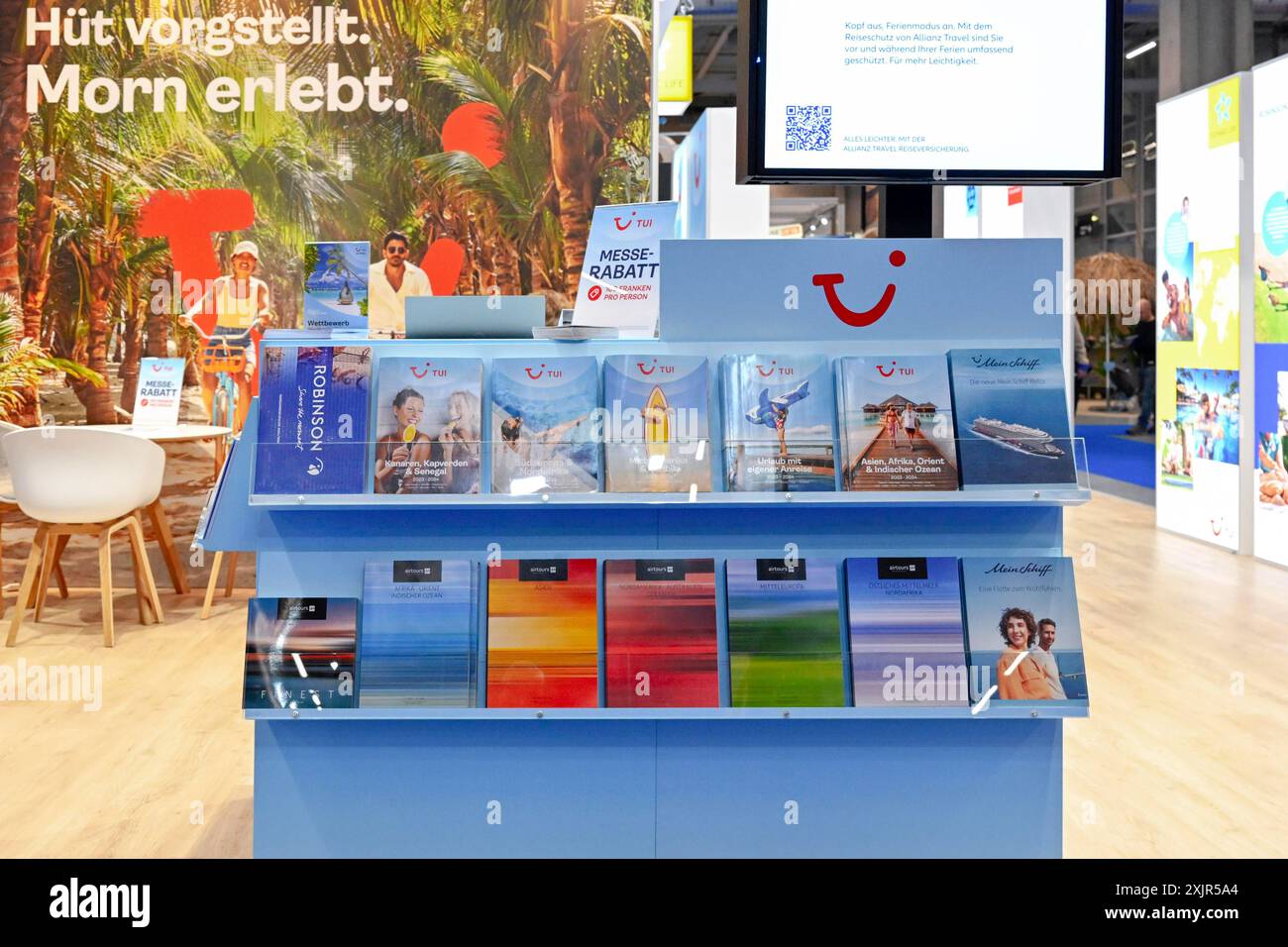 Exhibition stand Tui brochures Stock Photo - Alamy