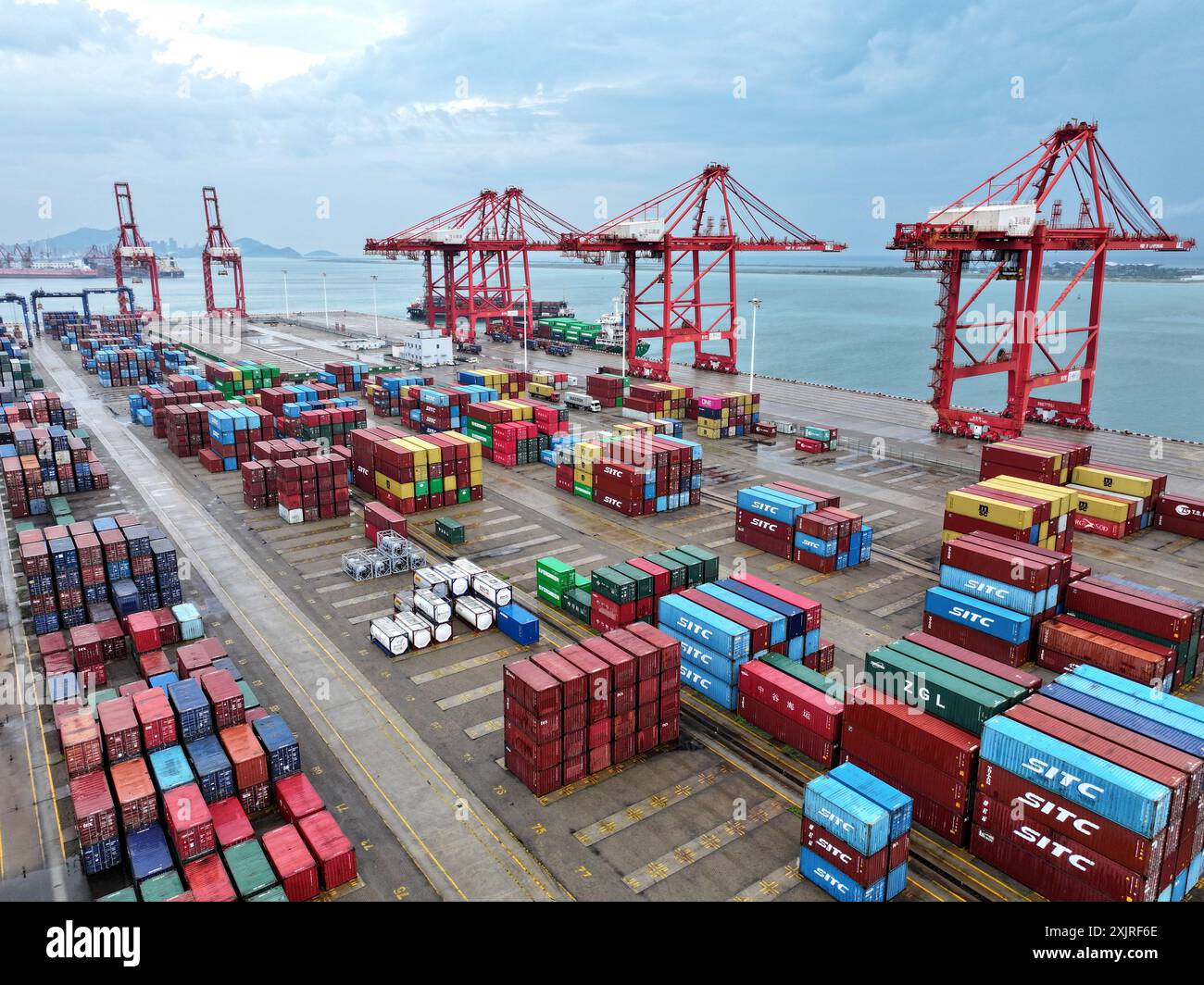 LIANYUNGANG, CHINA - JULY 20, 2024 - Cargo ships stop at their berths ...