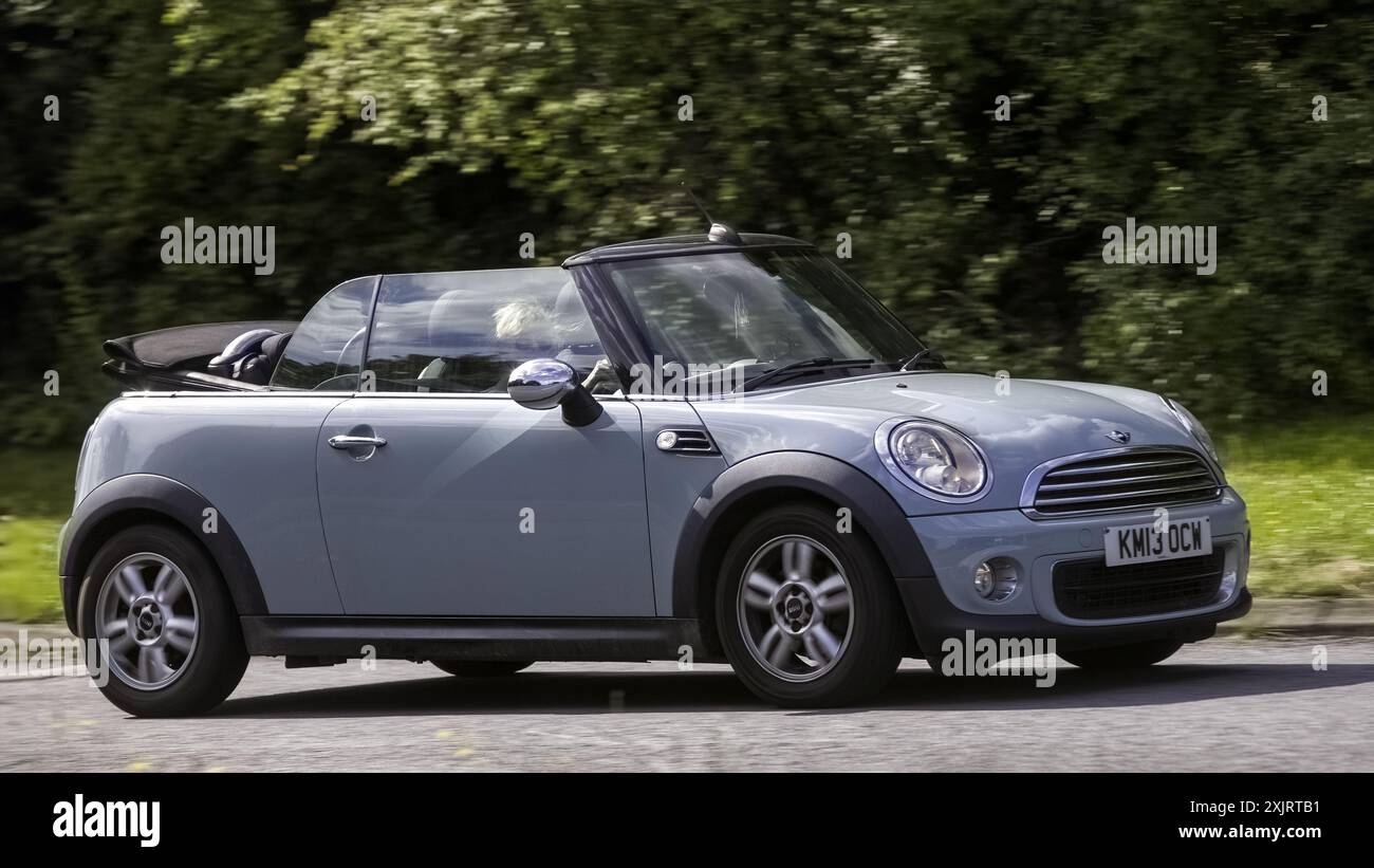 Milton Keynes,UK - July 18th 2024: 2013 convertible Mini car driving on ...