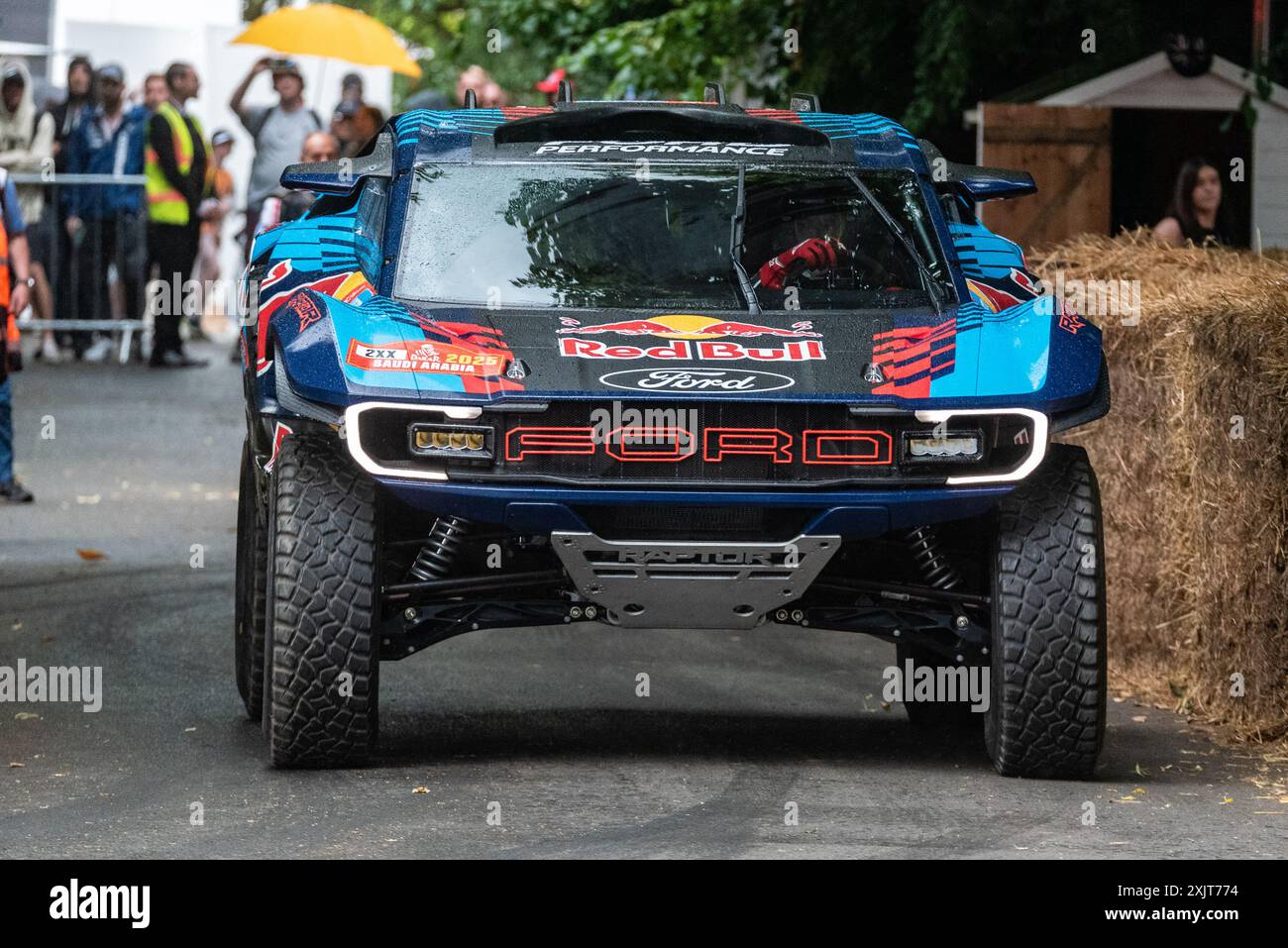 2024 Ford Dakar Raptor rally raid race car driving up the hill climb track at the Goodwood Festival of Speed 2024 motorsport event, UK Stock Photo