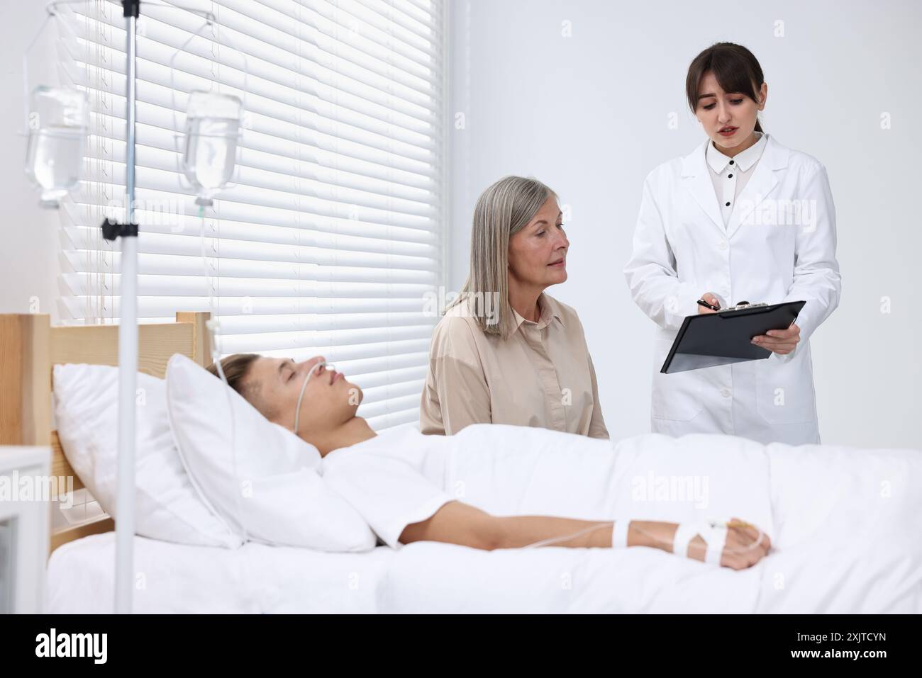 Mature mother and son doctor hi-res stock photography and images - Alamy