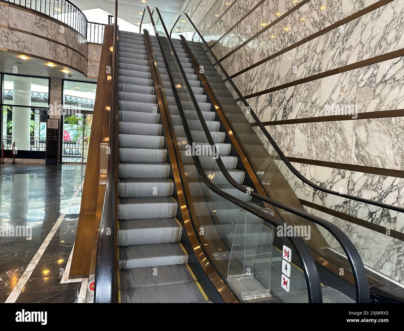 Mall Hand Rails Modern escalators with handrails in shopping mall Stock Photo - Alamy