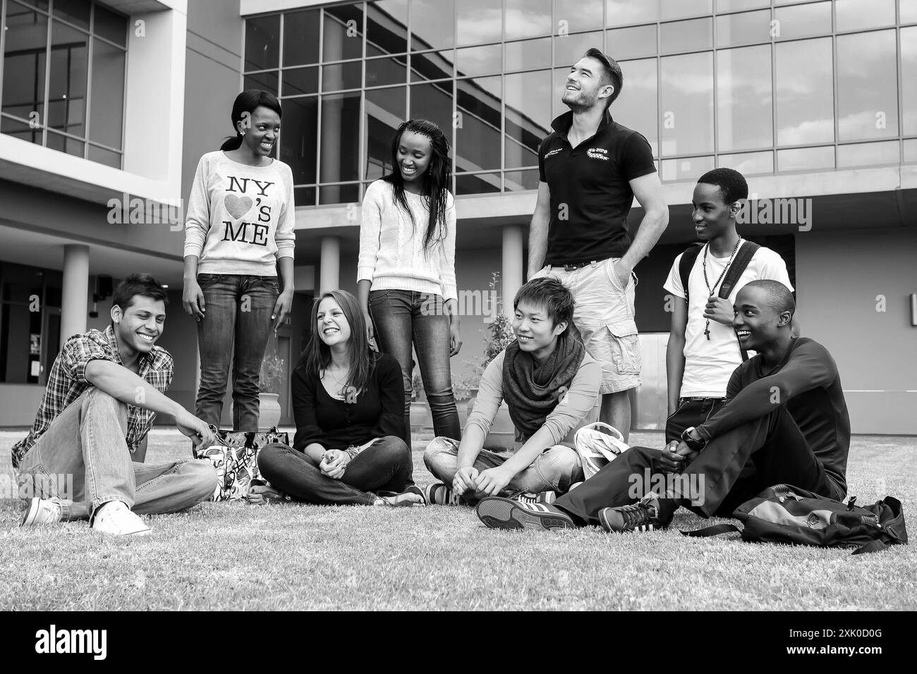 Group young people sitting outside Black and White Stock Photos ...