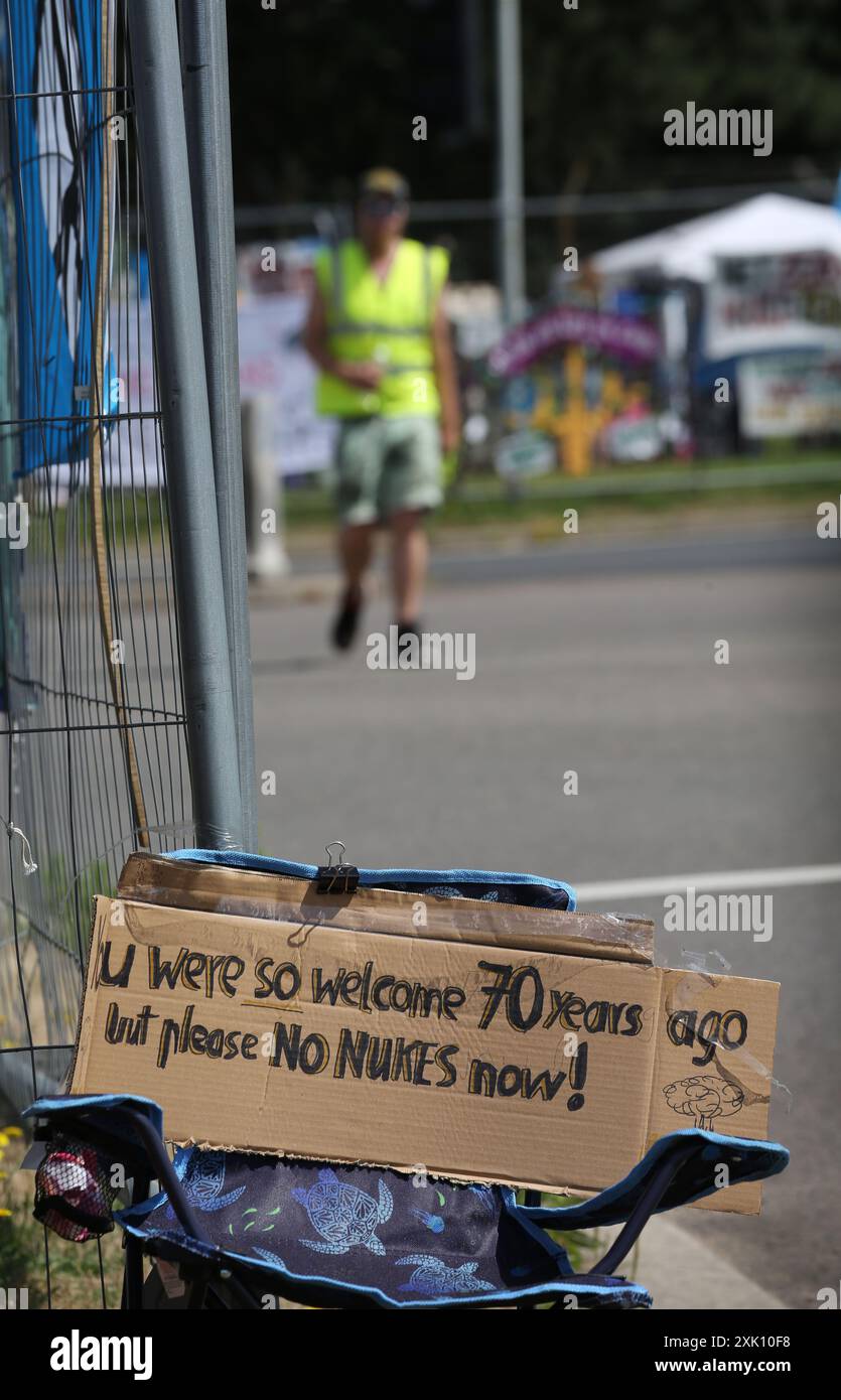July 20, 2024, Lakenheath, England, UK: A protester leaves a sign ...