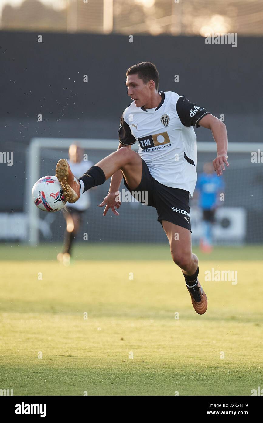 Valencia, Spain. 20th July, 2024. VALENCIA, SPAIN - JULY 20: Cesar Tarrega of Valencia CF controls the ball during the pre-season friendly match between Valencia CF and CD Castellon at Ciutat Esportiva Antonio Puchades on July 20, 2024 in Valencia, Spain. (Photo by Jose Torres/Photo Players Images/Magara Press) Credit: Magara Press SL/Alamy Live News Stock Photo