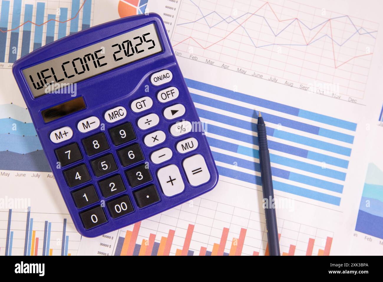 A coloured wooden cubes with word 2025 and magnifying glass with word WELCOME on it. New year concept Stock Photo