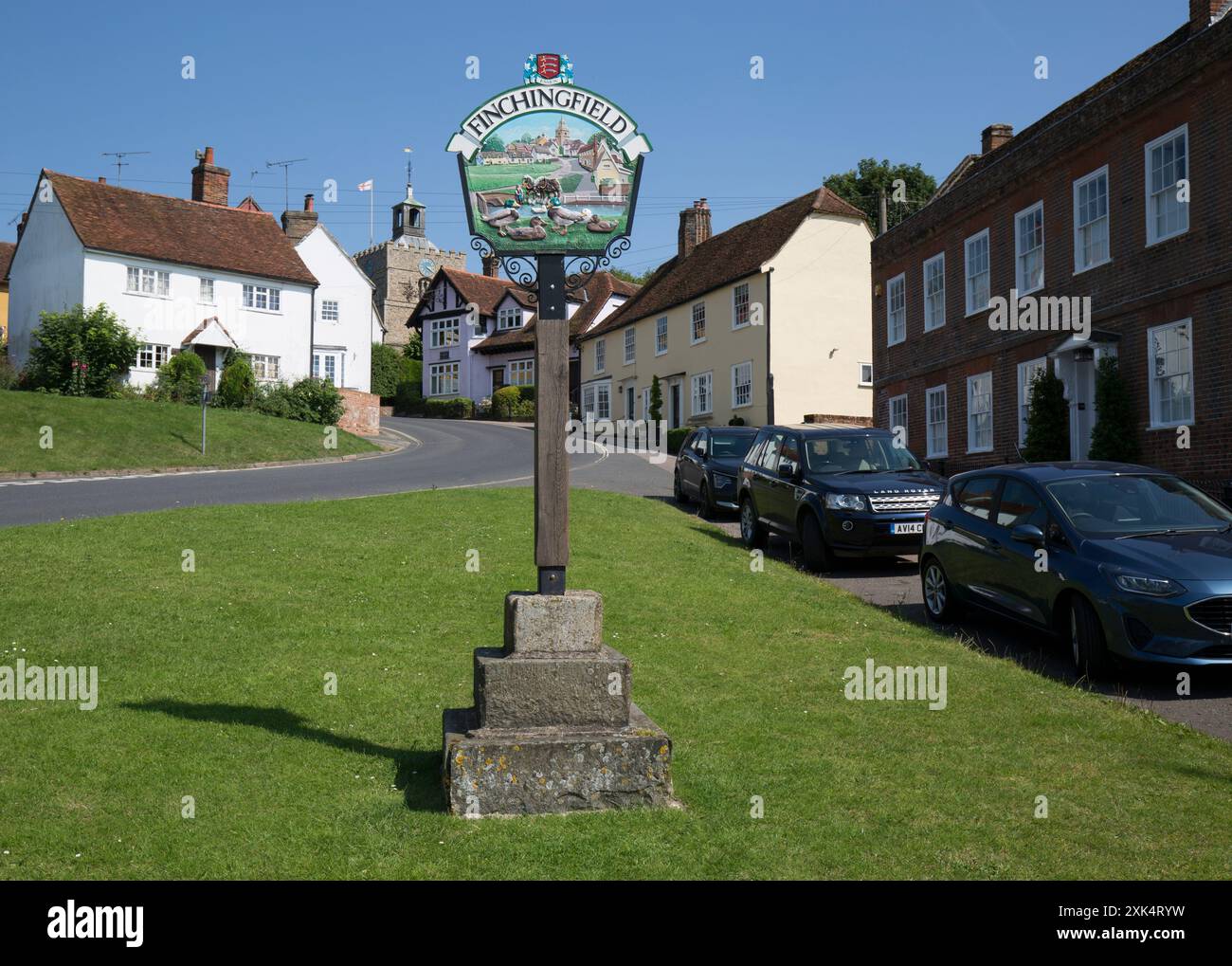 Village Sign St John The Baptist Church Cottagesand Village Green Finchingfield Essex Stock Photo