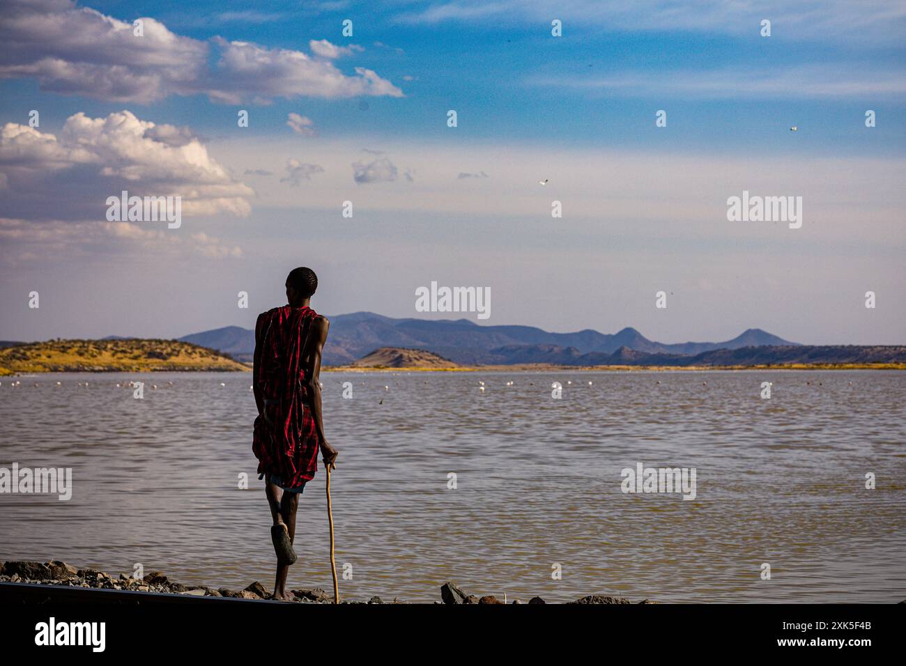 Lake Magadi Kenya Salt Lake Flamingo Home People Portraits Standing next to the water Kenya Landscapes east africa Stock Photo
