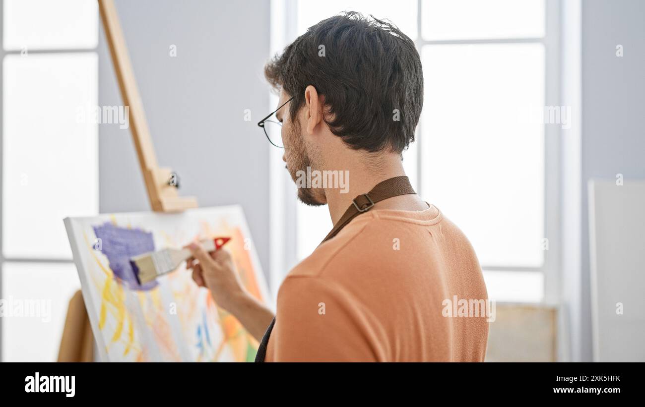 Bearded man paints on canvas hi-res stock photography and images - Alamy