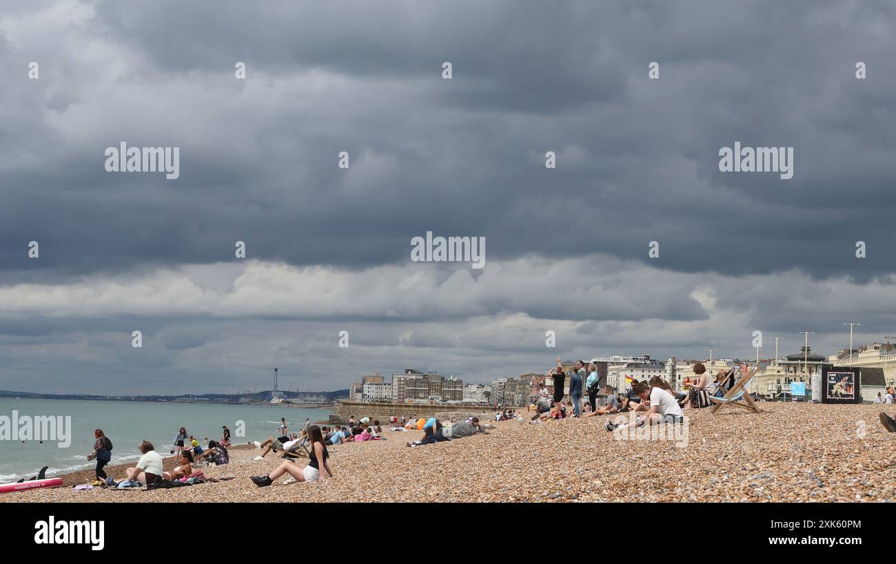 Storm clouds gather over the seafront on Brighton beach Stock Photo