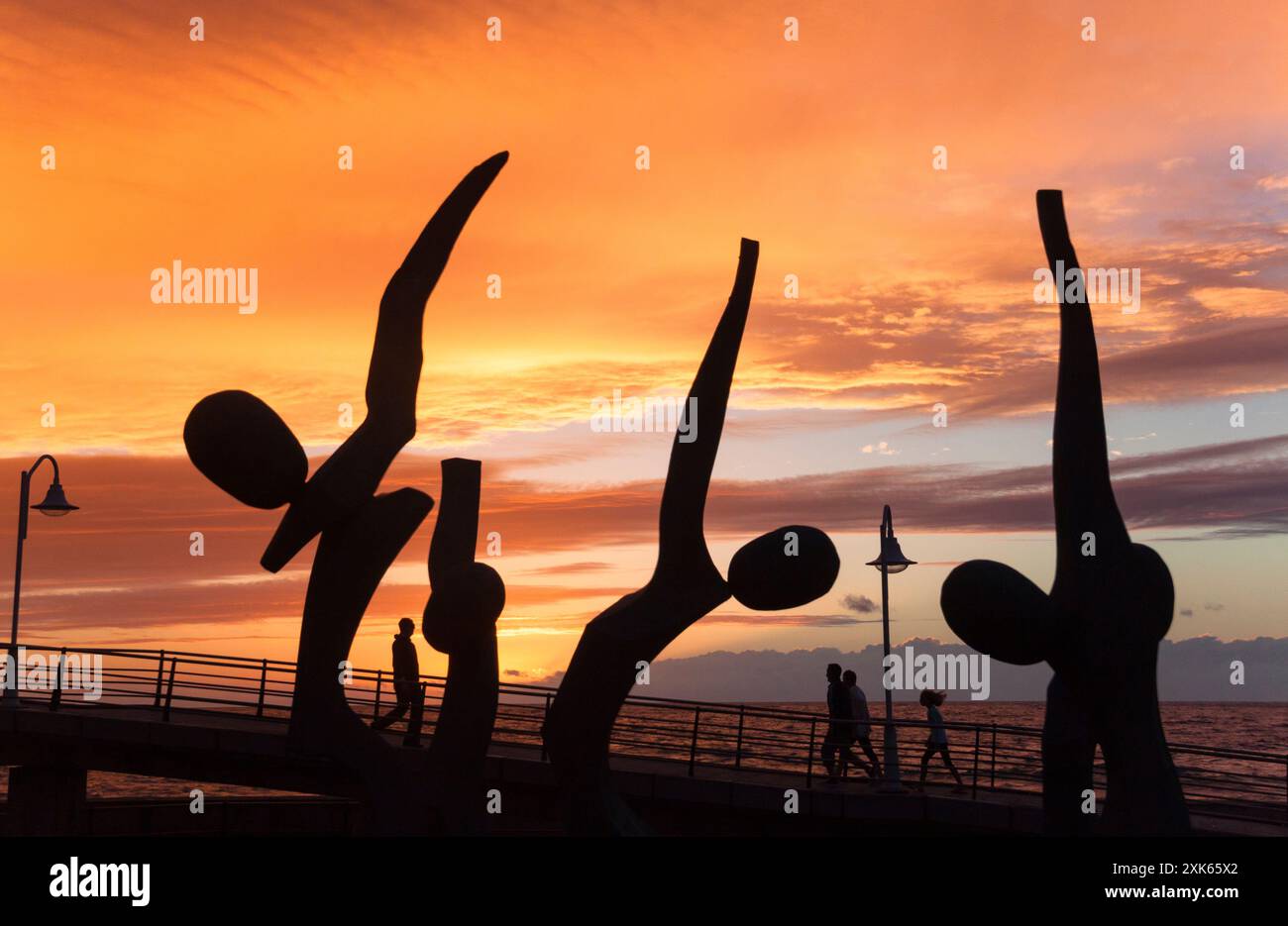 Sculpture of four dancing figures, in reference to the Fiesta de la Rama, Gran Canaria - Stock Image
