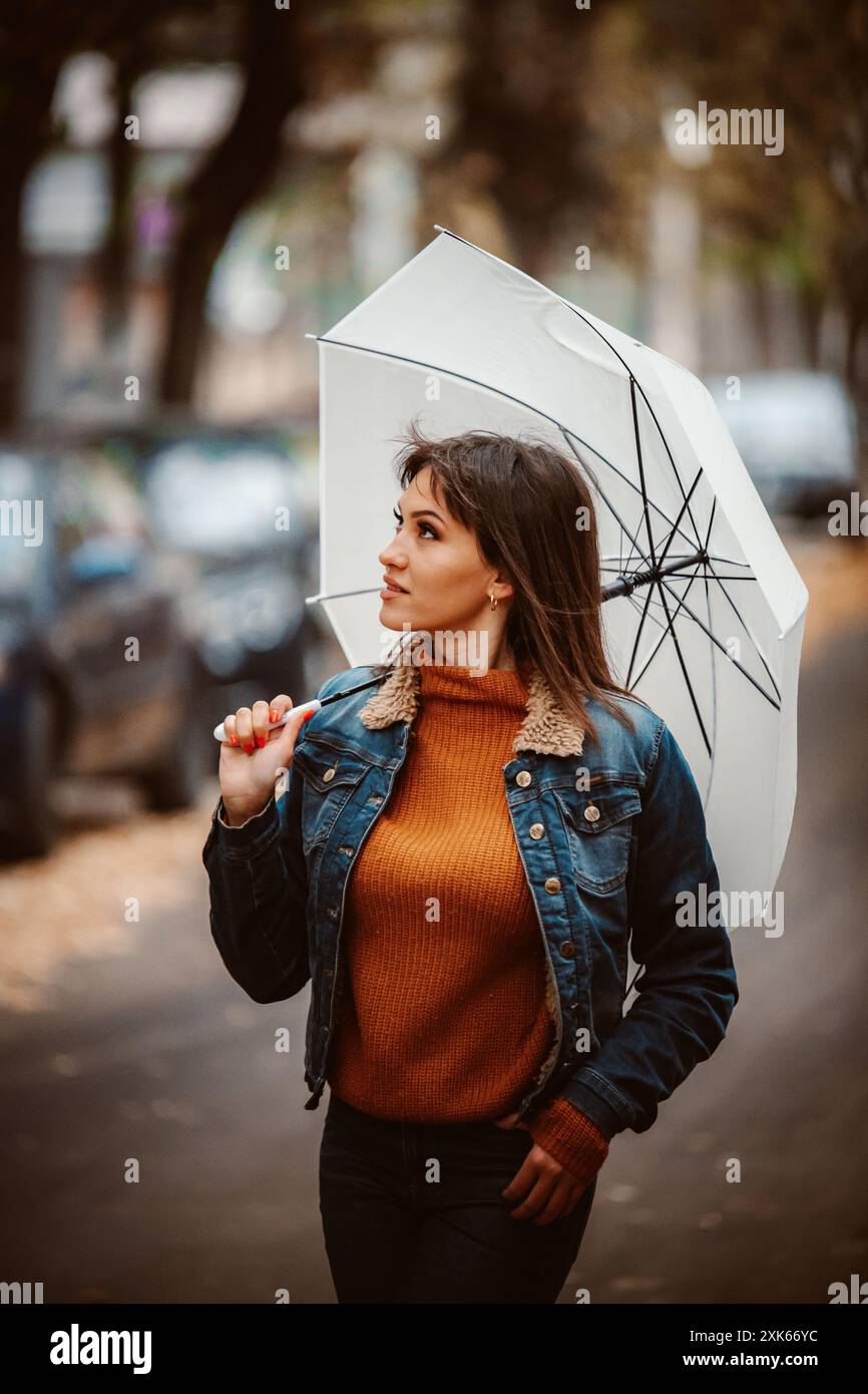 Umbrella denim jeans rain hi res stock photography and images Alamy