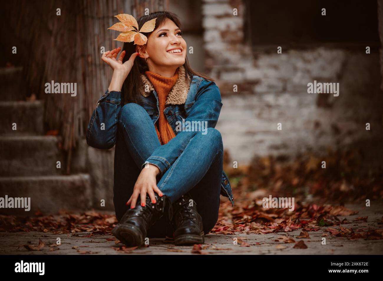 Crossed legs wearing blue jeans hi-res stock photography and images - Alamy