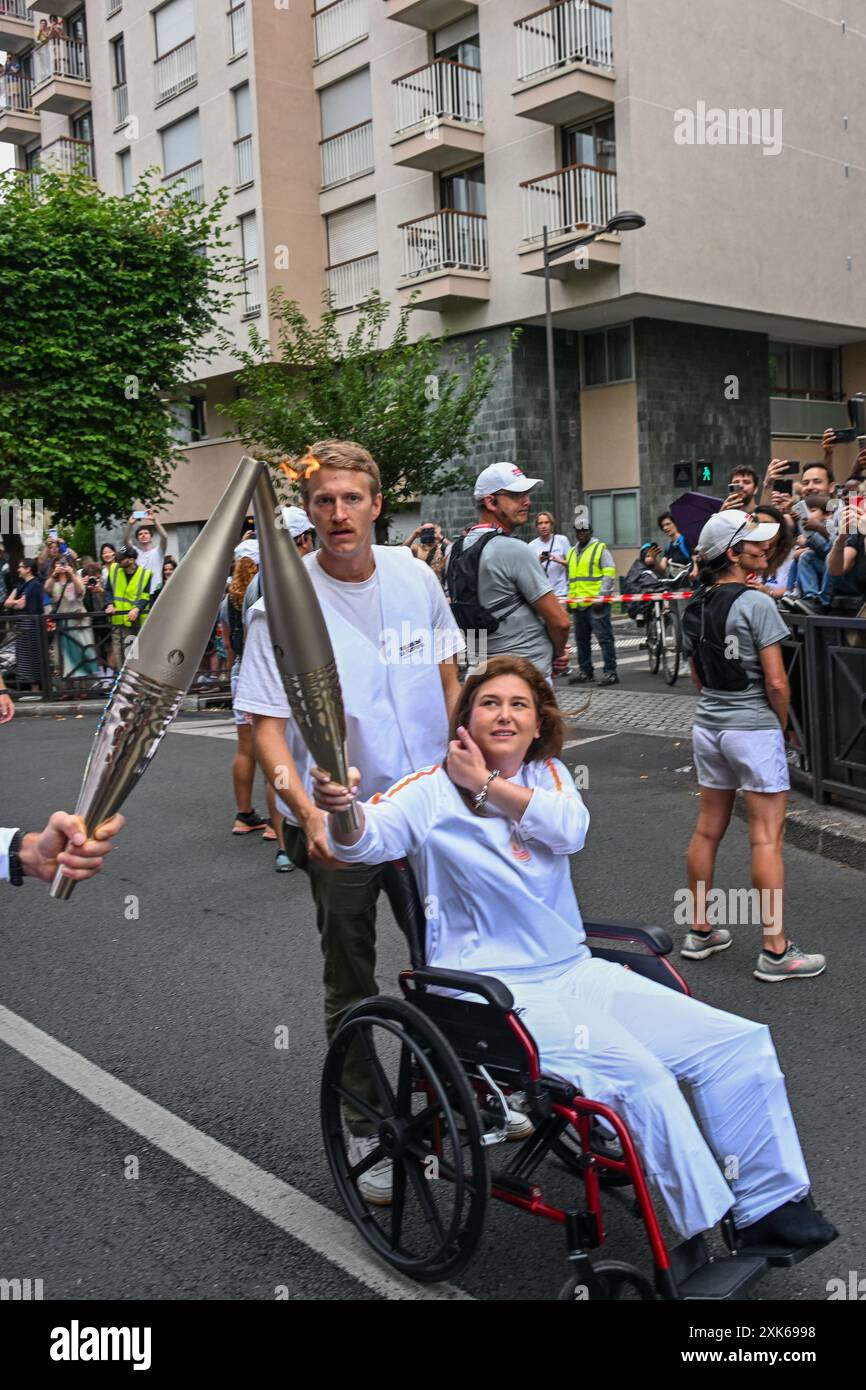 Lebanese photojournalist Christina Assi carries the Olympic torch, to ...