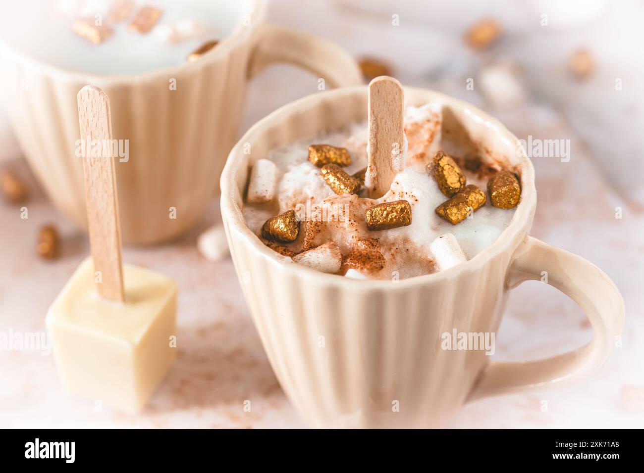 Cup with hot chocolate dipping sticks and marshmallows Stock Photo