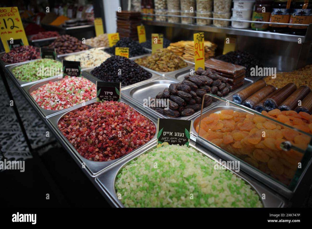 Different infusions for brewing tea each of different fruit & dried fruit like dates, raisins & apricots on sale , stand in the Machane Yehuda Market. Stock Photo