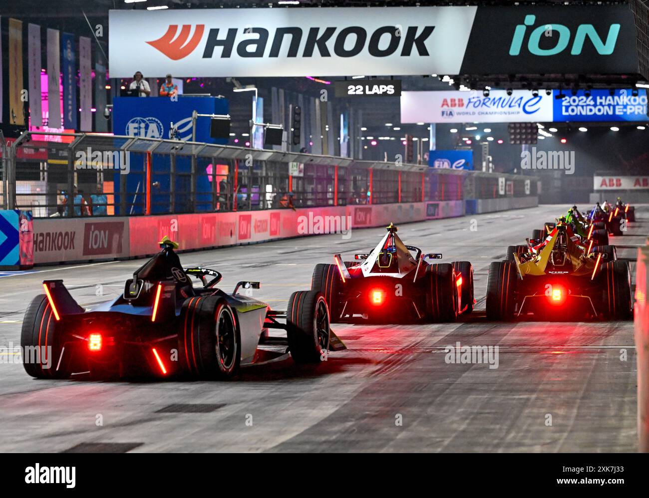 London, UK. 21st July, 2024. Cars race down the home straight in the ...