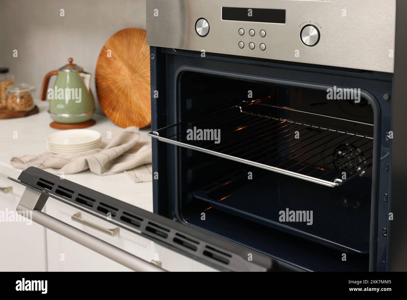 Open electric oven in kitchen. Cooking appliance Stock Photo