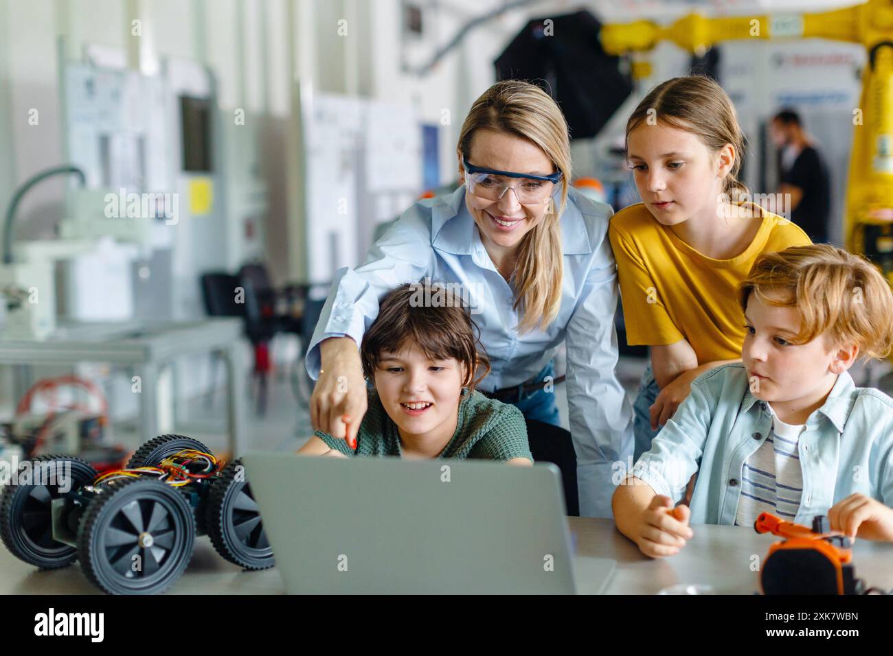 Children learning robotics in Elementary school. Young students ...