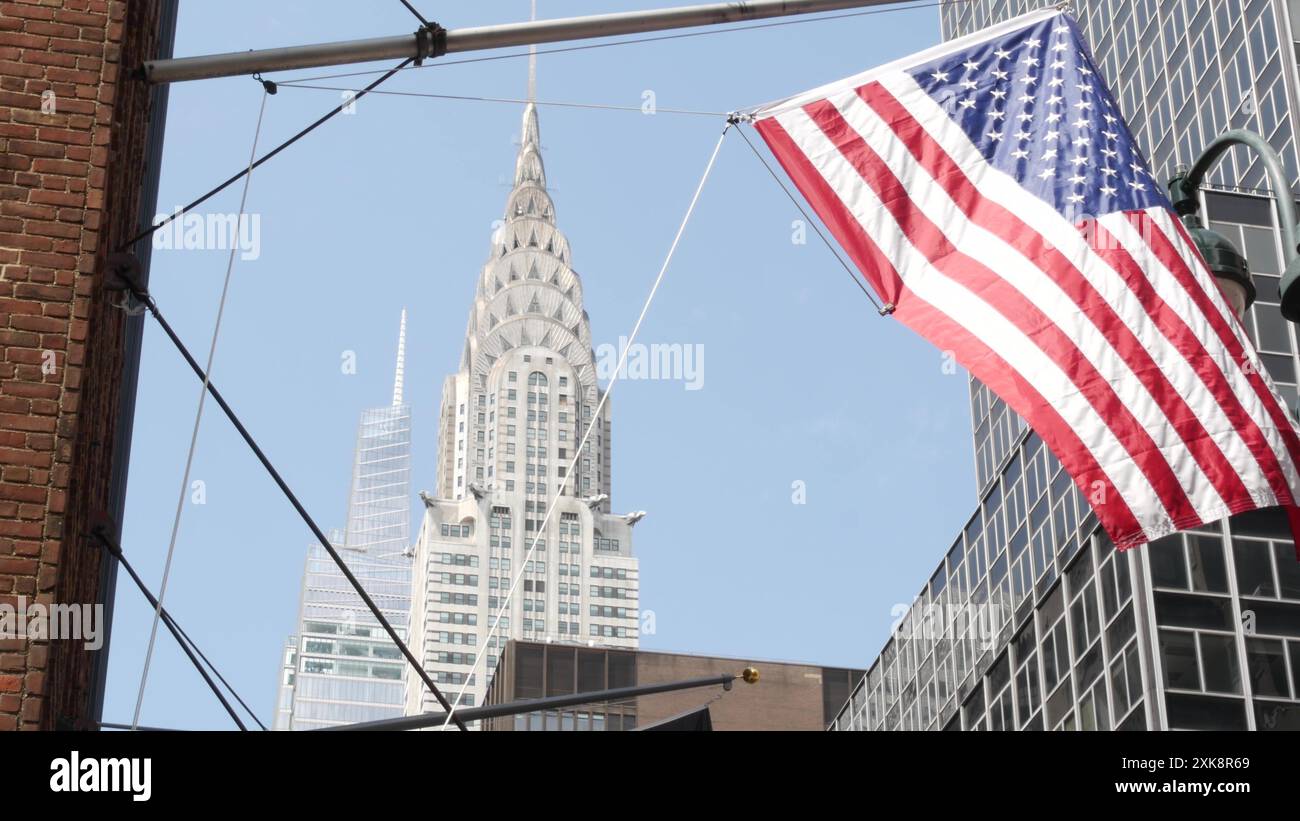 New York, american flag waving. Chrysler building. Manhattan midtown 42 ...