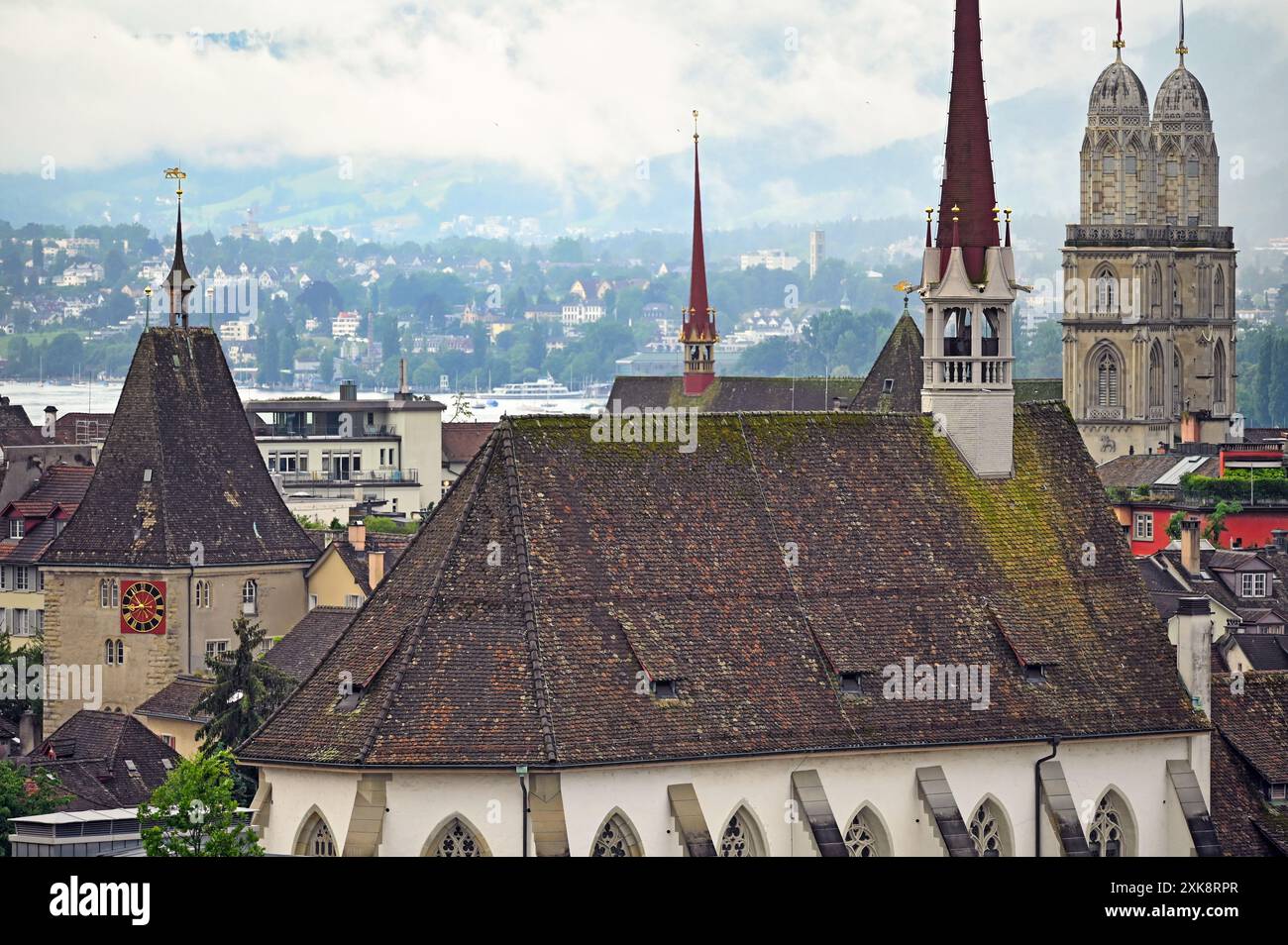 Church clock towers in Zurich Switzerland cloudy morning Stock Photo ...