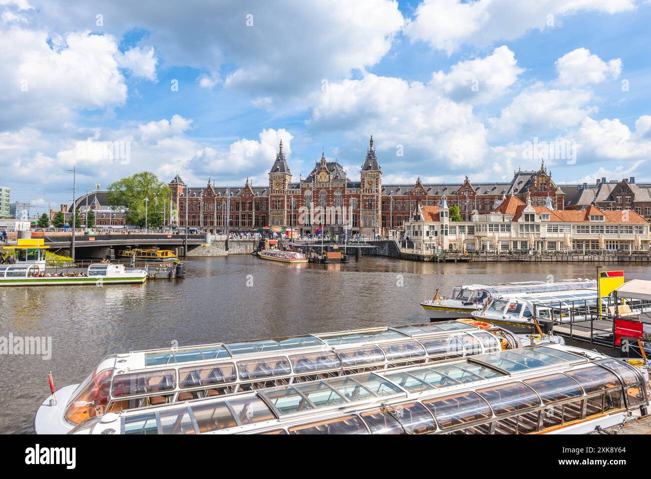 Amsterdam Centraal station, the largest railway station in Amsterdam, North Holland, the Netherlands Stock Photo