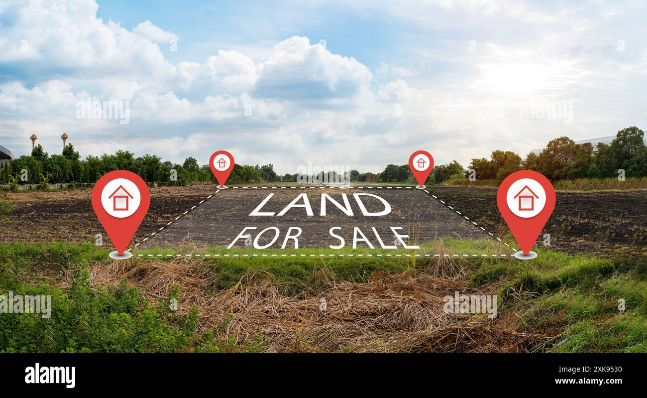 Land plot management - real estate concept with a vacant land on a green field available for building construction and housing subdivision in a reside Stock Photo