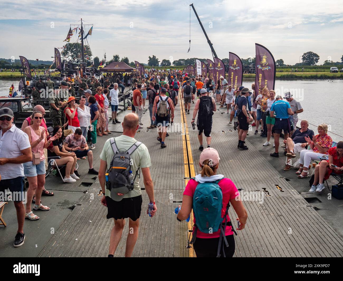 July 16th to 19th, Nijmegen. The International Four Days Marches (in Dutch 'De Vierdaagse') is the world’s biggest multi-day walking event and is seen as the prime example of sportsmanship and international bonding between military servicemen and women and civilians from many different countries. This year, because of hot temperatures, all the routes were shorter by 10 km on the last day. Stock Photo