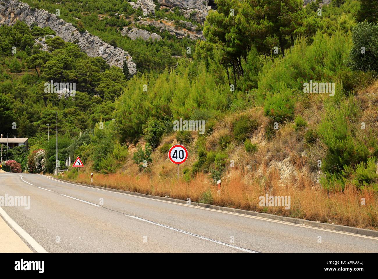 Traffic sign 40, Speed limit 40, on mountain road in Croatia, selective ...