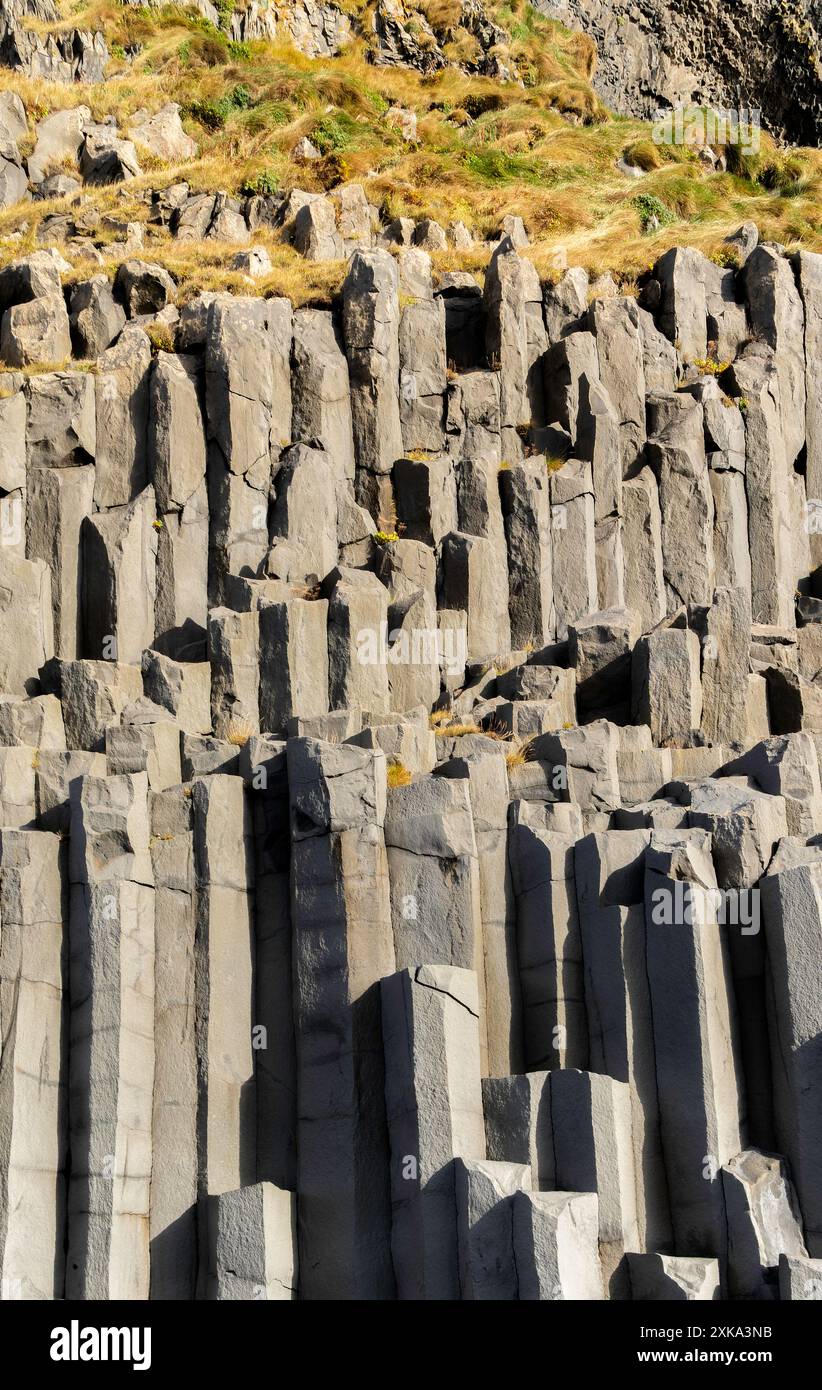 Gardar basalt columns, Iceland. A rocky cliff with many large, jagged ...