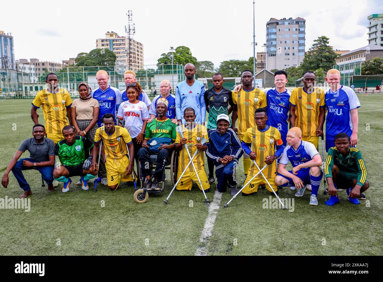 Dar Es Salaam, Tanzania. 20th July, 2024. Players of Albinism Sports Club pose with players of Sauti Parasports Club before a friendly match at the Jakaya M. Kikwete Youth Park in Dar es Salaam, Tanzania, on July 20, 2024. TO GO WITH 'Feature: Sport against injustice, albino and amputee teams unite in Tanzania' Credit: Emmanuel Herman/Xinhua/Alamy Live News Stock Photo