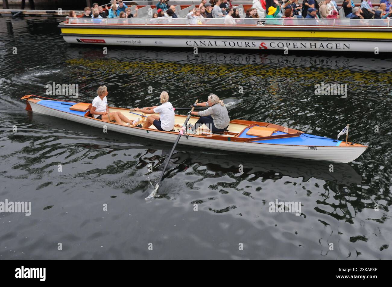 Danish Rowing Kit Copenhagen/ Denmark/22 July 2024/Female danes boaT rowing as ports in ...
