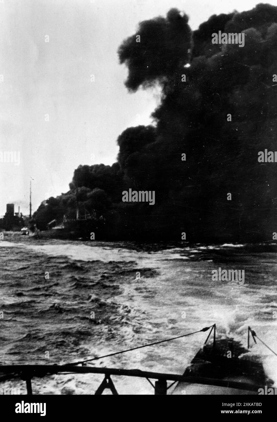 A burning tanker, photographed from on board the German submarine U 96 (commanded by Heinrich Lehmann-Willenbrock), presumably during an enemy voyage in April 1941. [automated translation] Stock Photo