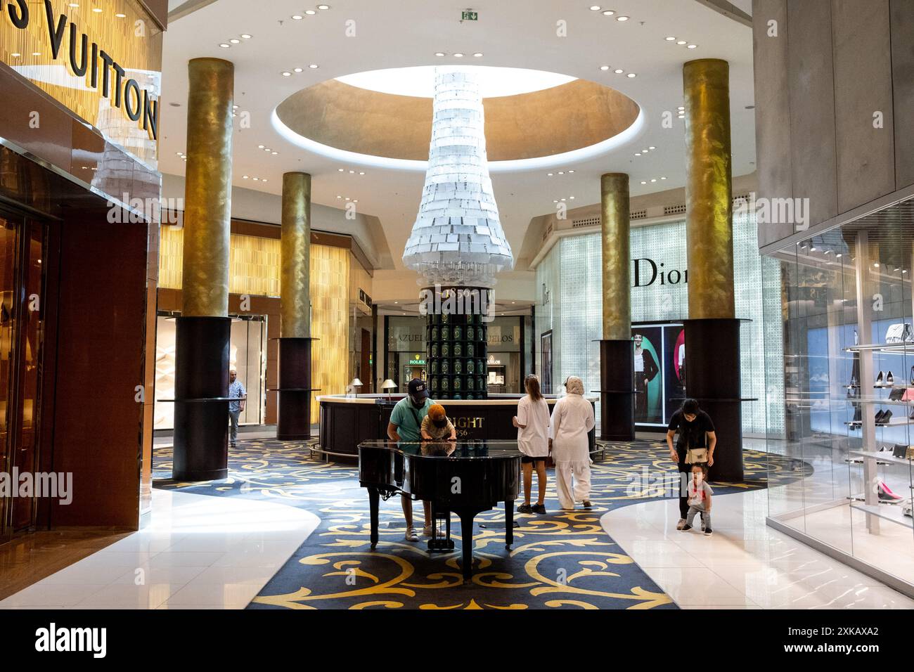 Family with children in the luxury shopping centre Morocco Mall in