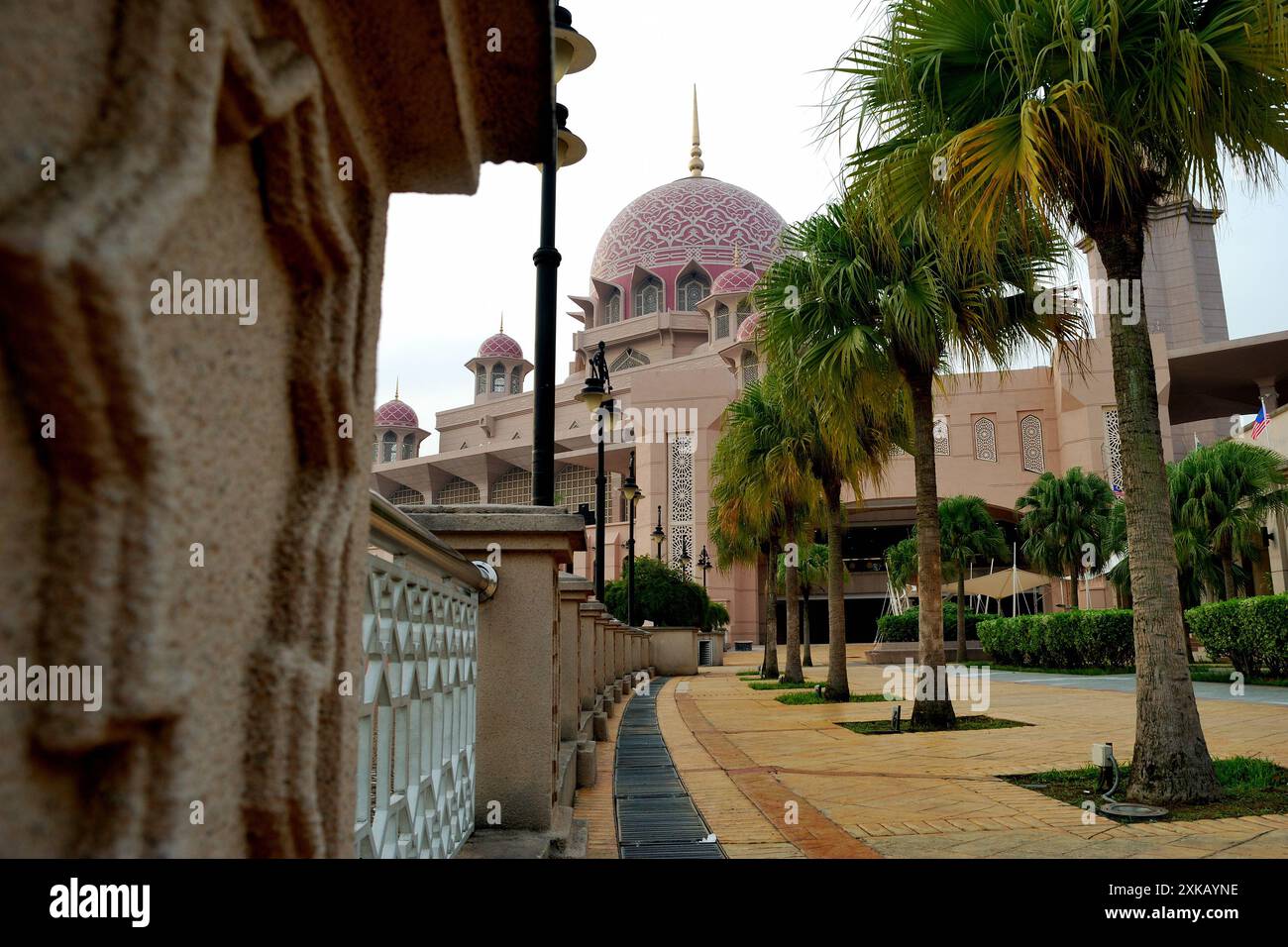 Partial view of The Putra Mosque, is the principal mosque of Putrajaya, Malaysia, located on Putra Square and is adjacent to man-made Putrajaya Lake Stock Photo