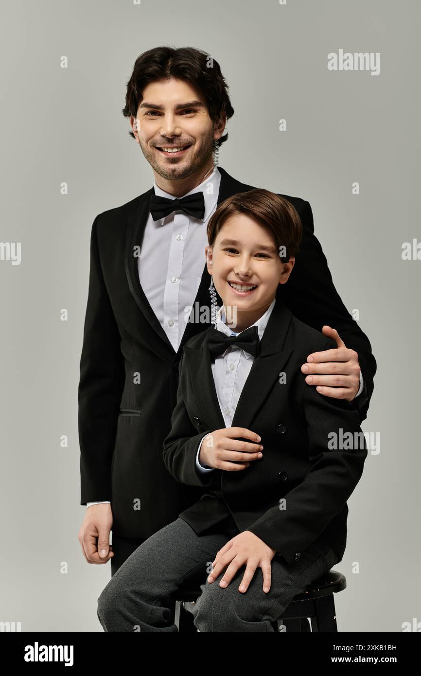 Elegant father and son smiling hi-res stock photography and images - Alamy