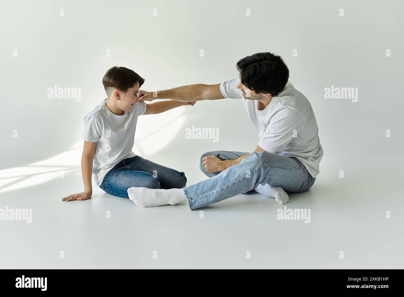 Father son bonding engaging hi-res stock photography and images - Alamy
