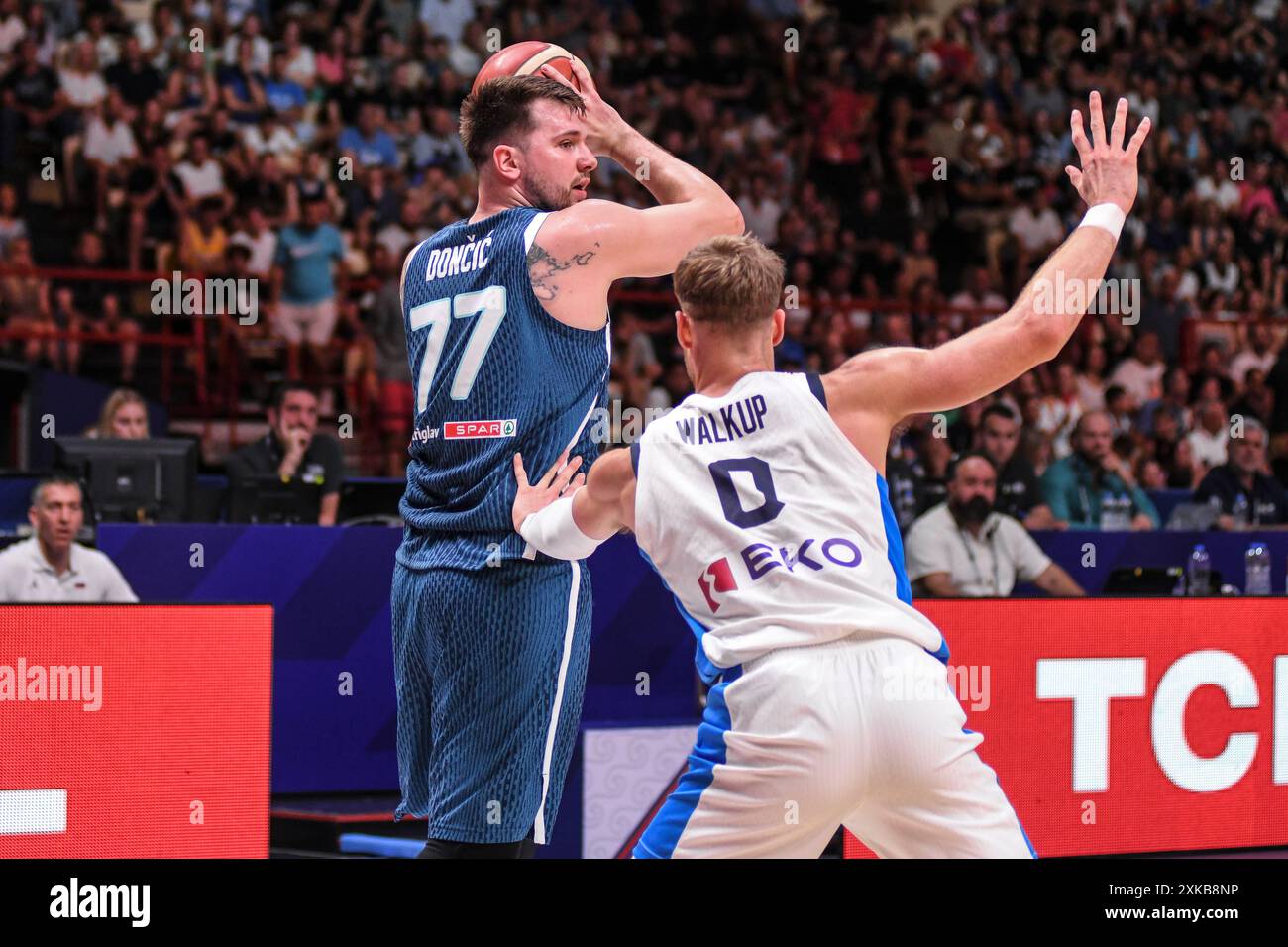 Luka Doncic (Slovenia) defended by Thomas Walkup (Greece). FIBA Olympic ...