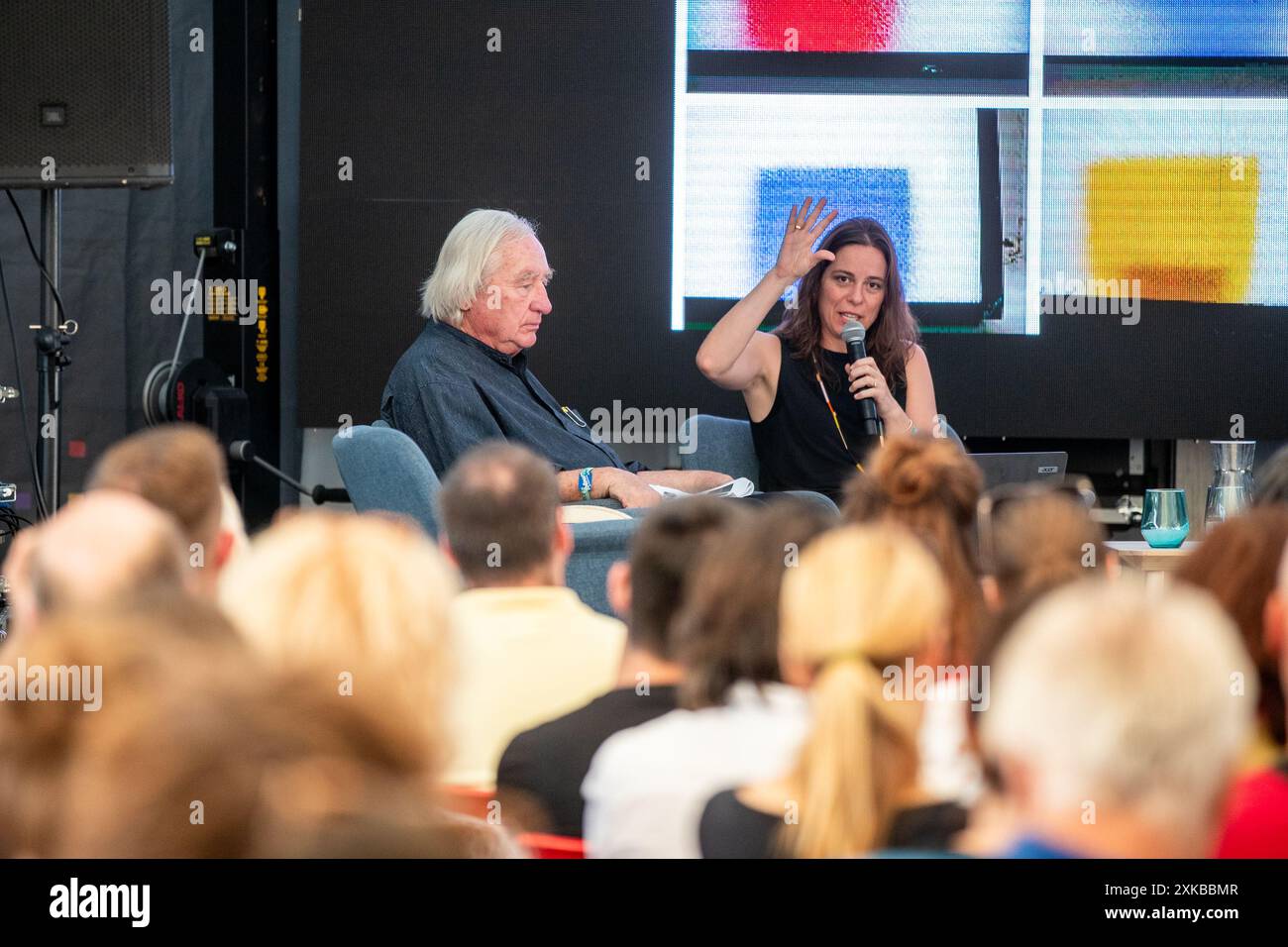 Ostrava, Czech Republic. 19th July, 2024. American architect Steven Holl, pictured left, who designed a new concert hall and the reconstruction of the municipal culture house in Ostrava and Adjunct Assistant Professor at Columbia University GSAPP and a licensed architect in New York Dimitra Tsachrelia speak during the lecture in the malting pot during music festival Colours of Ostrava 2024 in Ostrava, Czech Republic, July 19, 2024. Credit: Vladimir Prycek/CTK Photo/Alamy Live News Stock Photo