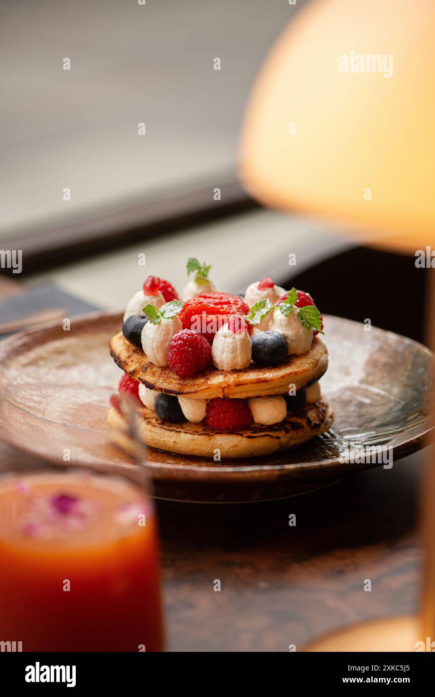 Photo inspiration: Fruit Emulsion Pancakes Reference: Homemade Fluffy Pancake With Fruits And Cream On The Top