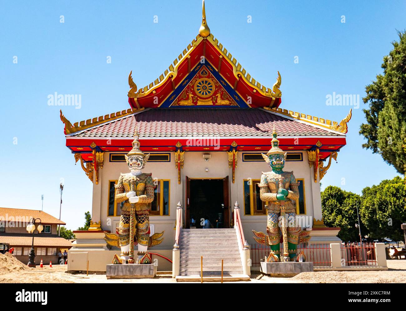 Statues of Yakshas, nature spirits guarding the front entrance of Wat Thai in Los Angeles, California, the largest Thai Buddhist temple in LA Stock Photo